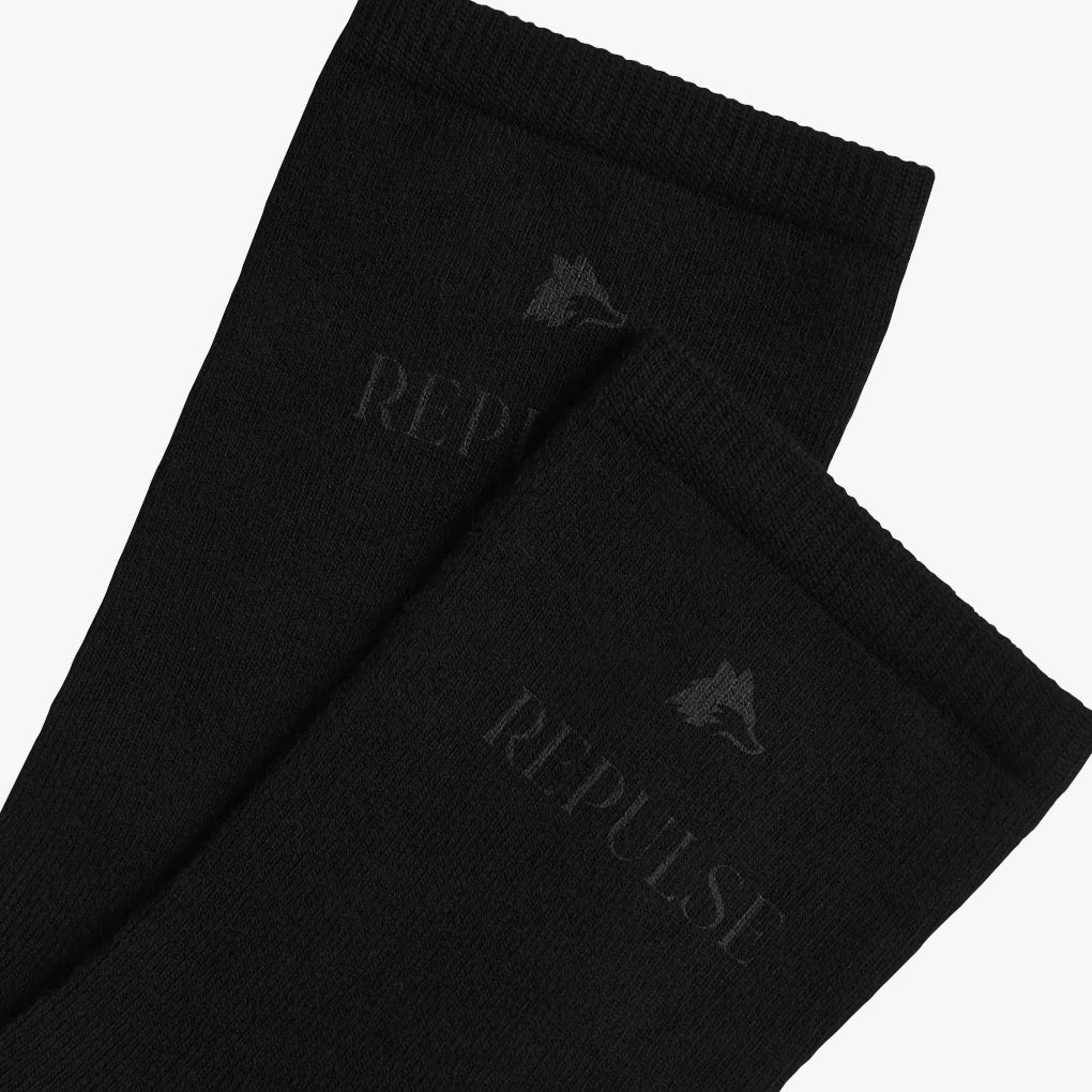 Black mid-length crew socks from the Winter '25 streetwear collection by Repulse Gaming, made from durable 200 GSM 100% polyester. Featuring a printed Repulse logo on the right side, complemented by matching stripes at the ankles. Designed for a comfortable fit with a 'one size fits most' approach, these socks blend functionality and streetwear aesthetics.