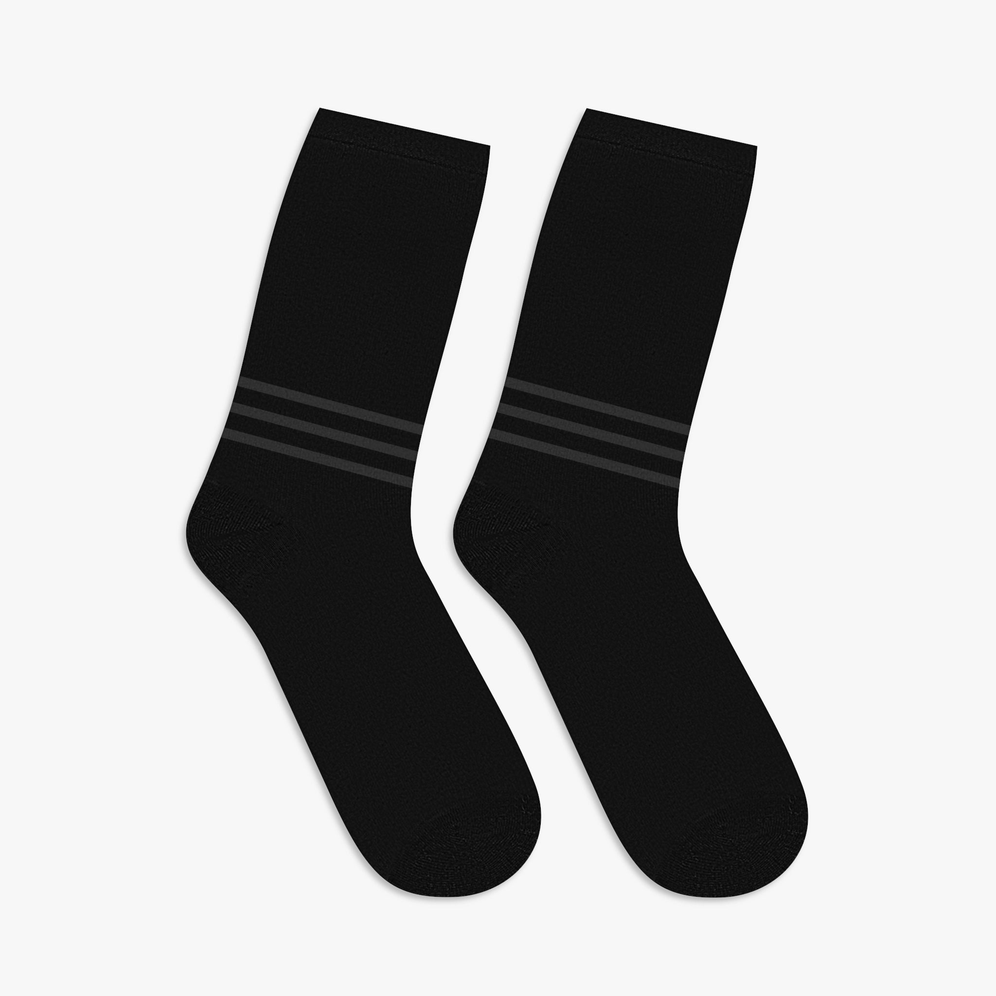 Black mid-length crew socks from the Winter '25 streetwear collection by Repulse Gaming, made from durable 200 GSM 100% polyester. Featuring a printed Repulse logo on the right side, complemented by matching stripes at the ankles. Designed for a comfortable fit with a 'one size fits most' approach, these socks blend functionality and streetwear aesthetics.